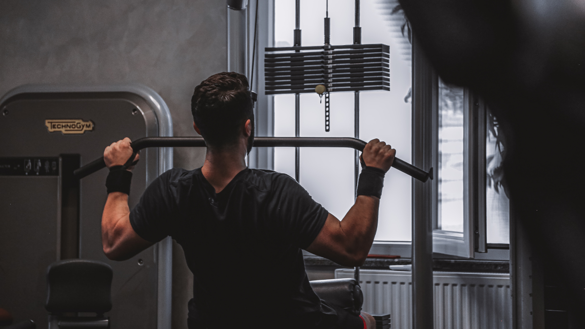Man doing a lat pull down